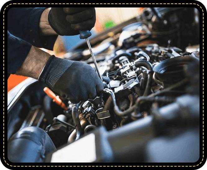 A person working on an engine in the middle of a car.