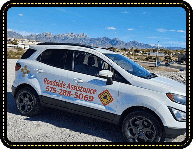 A white car with the words " roadside assistance 5 7 5-2 8 8-5 0 6 9 ".